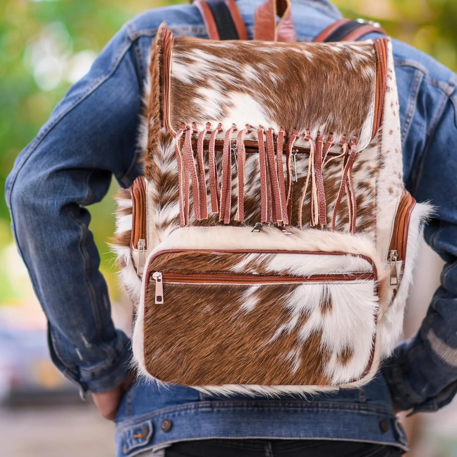 CHAYELL Luxury Real Cowhide Backpack for Women & Men  Hair-On Leather Cow Diaper Bag with Fringe | Handmade Artisan Cow Print Laptop Backpack for Travel, Work & Motherhood | Western Rucksack Knapsack