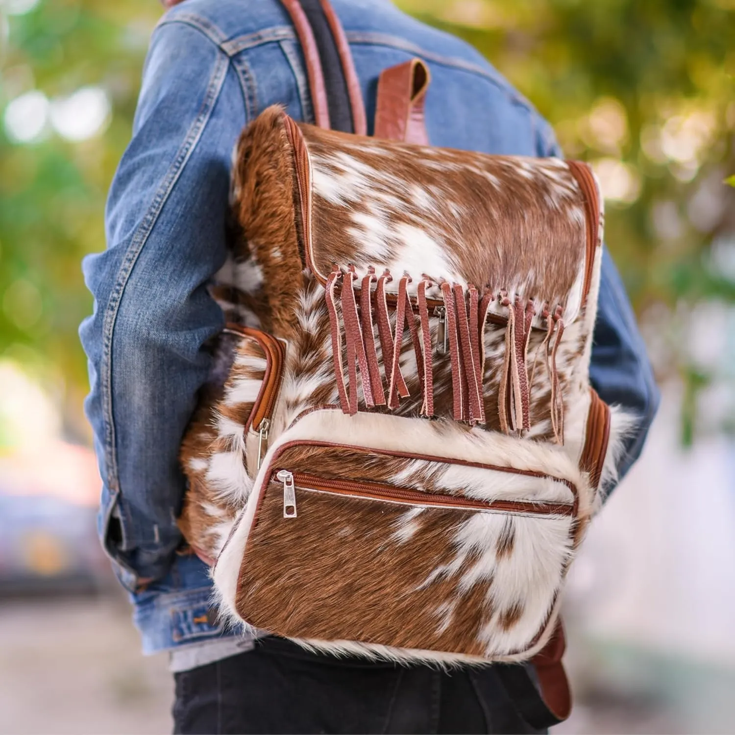 CHAYELL Luxury Real Cowhide Backpack for Women & Men  Hair-On Leather Cow Diaper Bag with Fringe | Handmade Artisan Cow Print Laptop Backpack for Travel, Work & Motherhood | Western Rucksack Knapsack